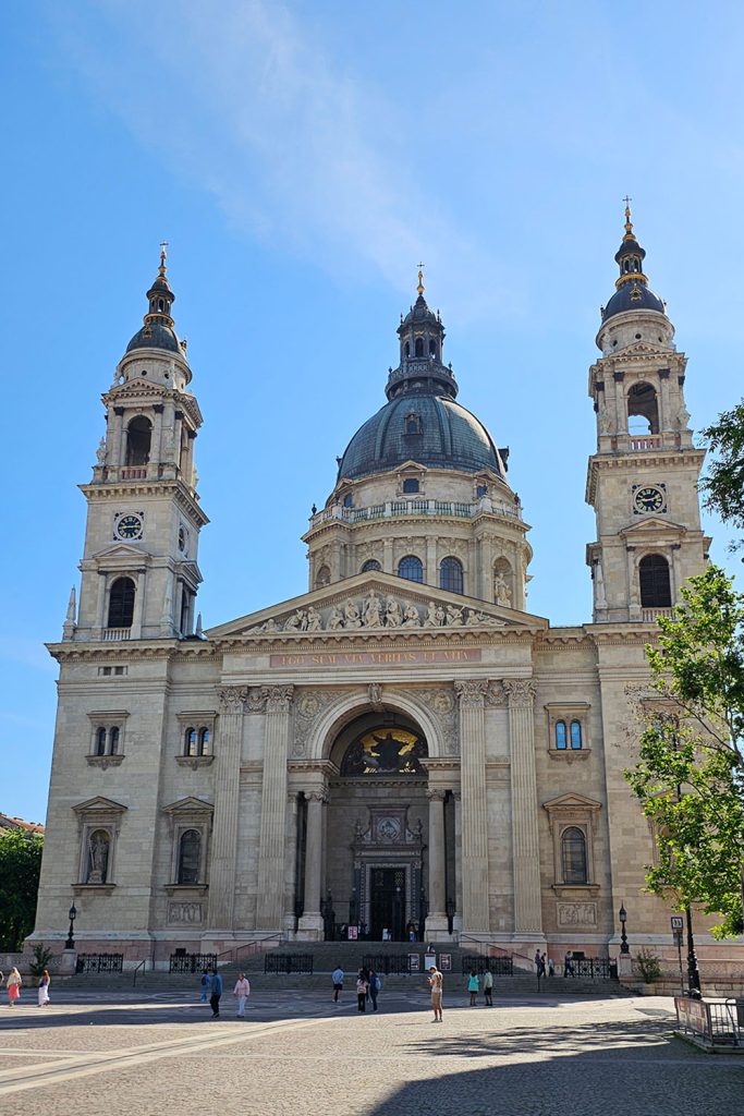 St Stephen's Basilica on a quit spring morning with few people walking in front of it