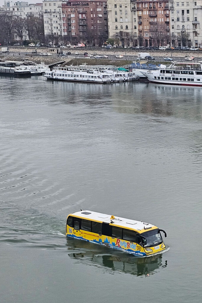 Riverrride sightseeing bus floating in the Danube