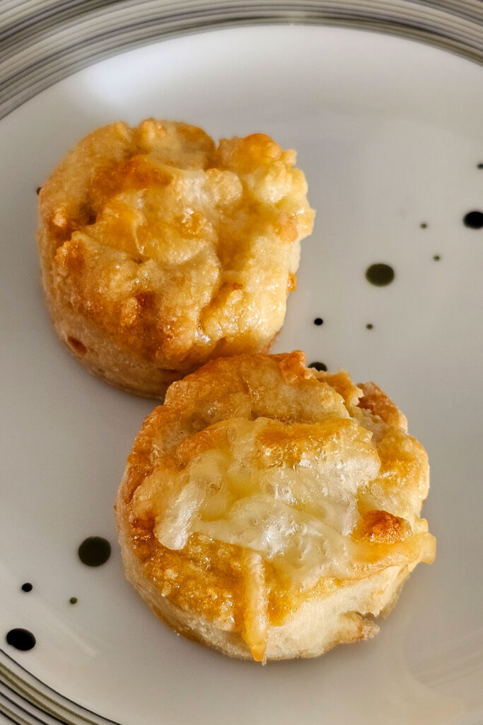 homemade pogácsa with cheese on top