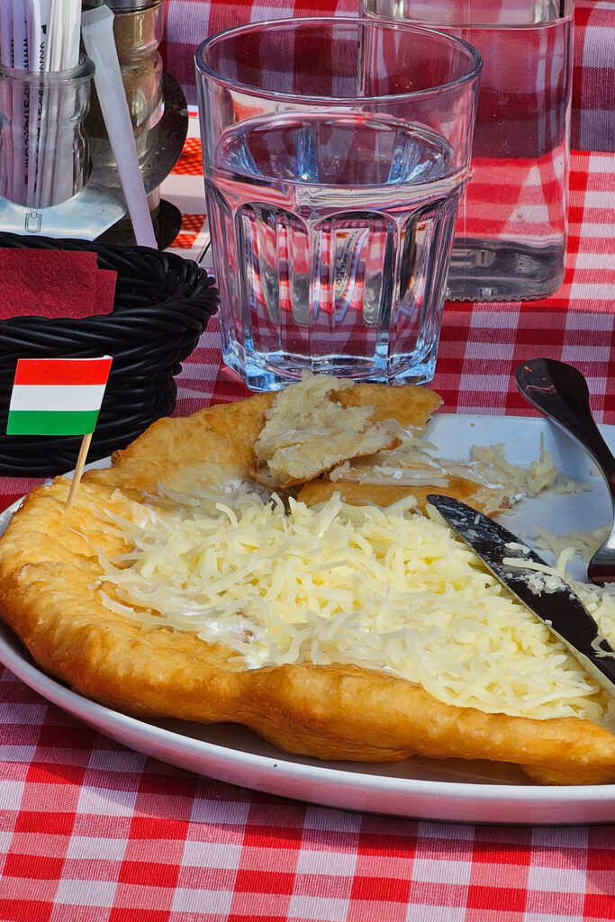 lángos with sour cream and cheese