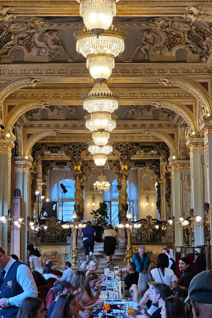 people eating and drinking in New York Cafe Budapest