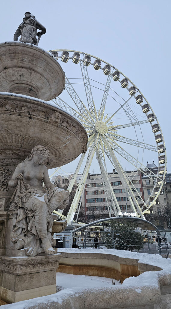 Ferris Wheel and Danubius Fountain in Budapest